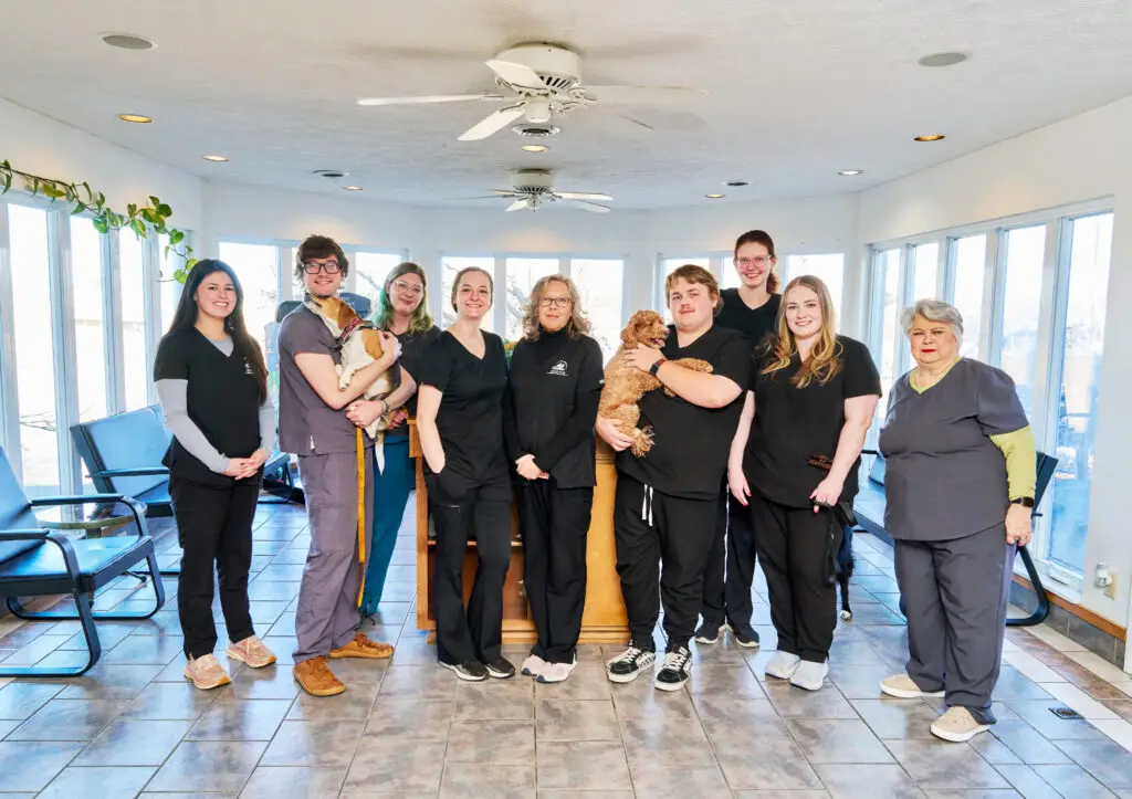Tipton Ridge Veterinary Medical Center team posing for group photo in animal hospital lobby
